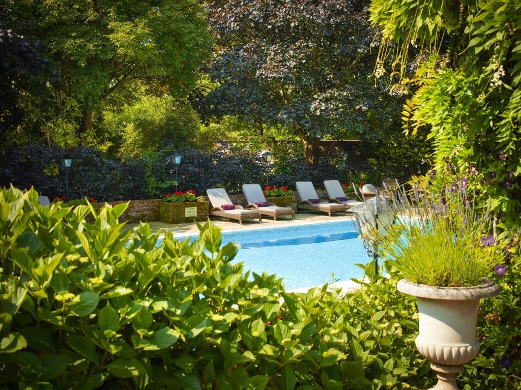 Chewton Glen loungers beautiful hotels with pools for the summer